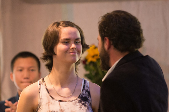 being introduced, and receiving her diploma